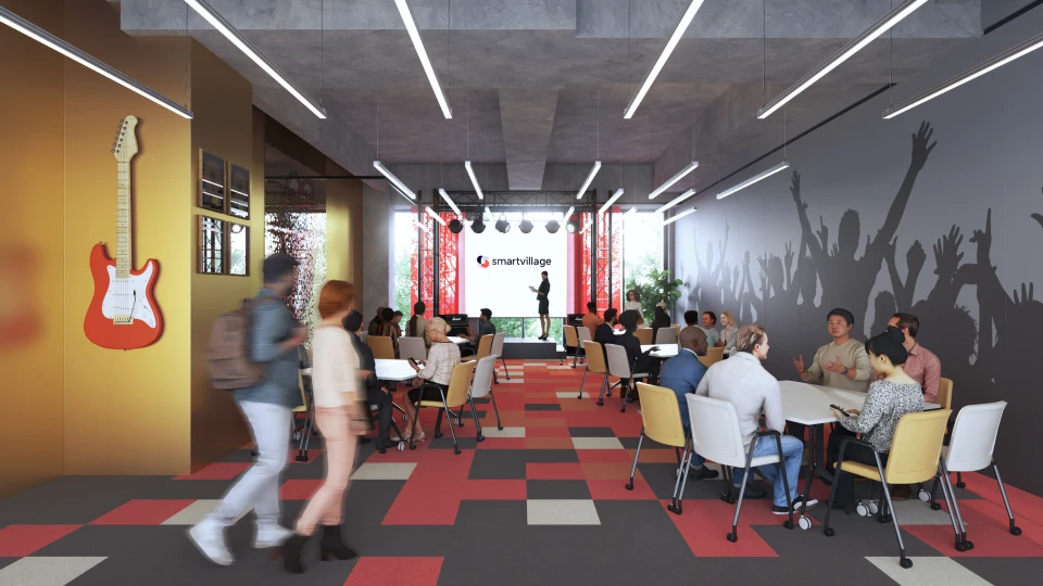 Dynamische Event-Location mit Bühne, auf der eine Präsentation stattfindet, umgeben von kreativer Wandkunst und modernen Möbeln